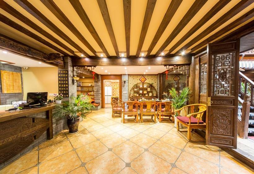 Отель Lijiang He Mu Ju Family Inn