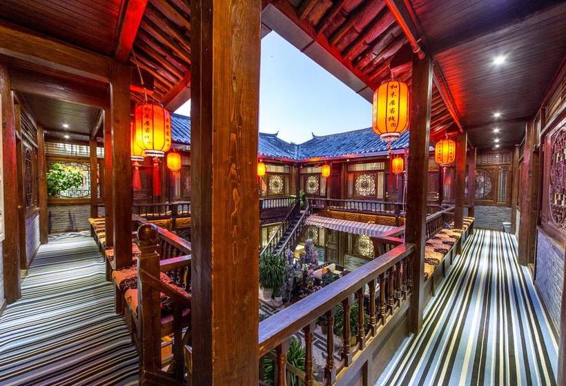 Отель Lijiang He Mu Ju Family Inn