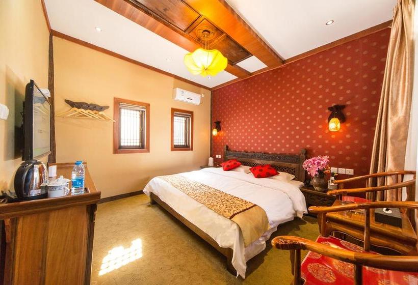 Отель Lijiang He Mu Ju Family Inn