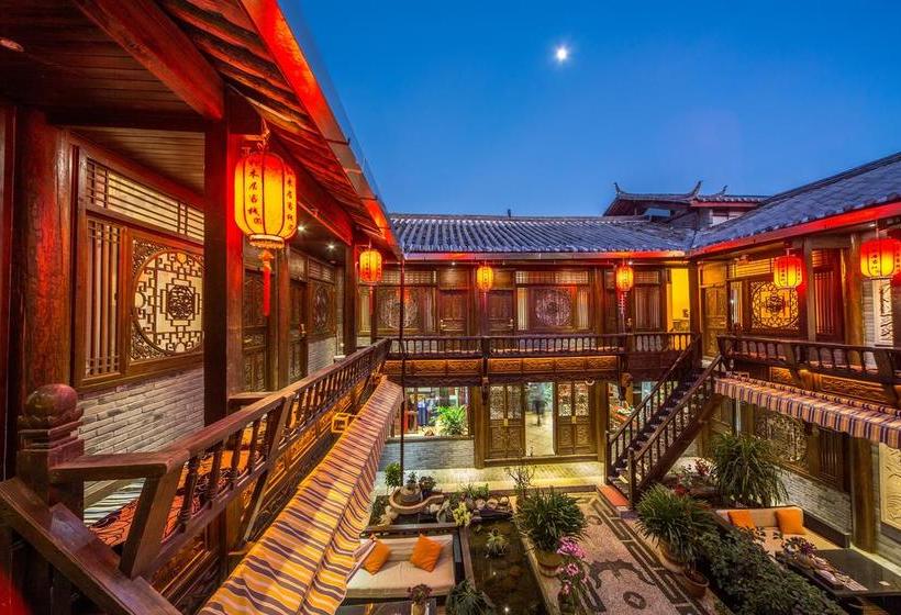 Отель Lijiang He Mu Ju Family Inn