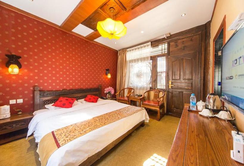 Отель Lijiang He Mu Ju Family Inn