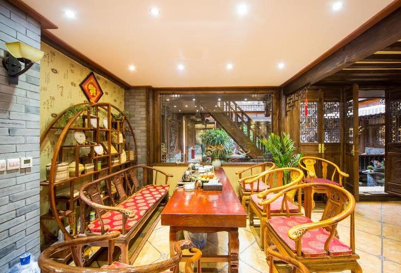 Отель Lijiang He Mu Ju Family Inn