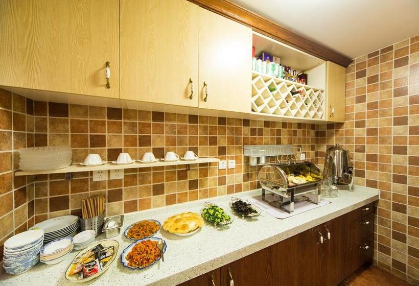 Отель Lijiang He Mu Ju Family Inn