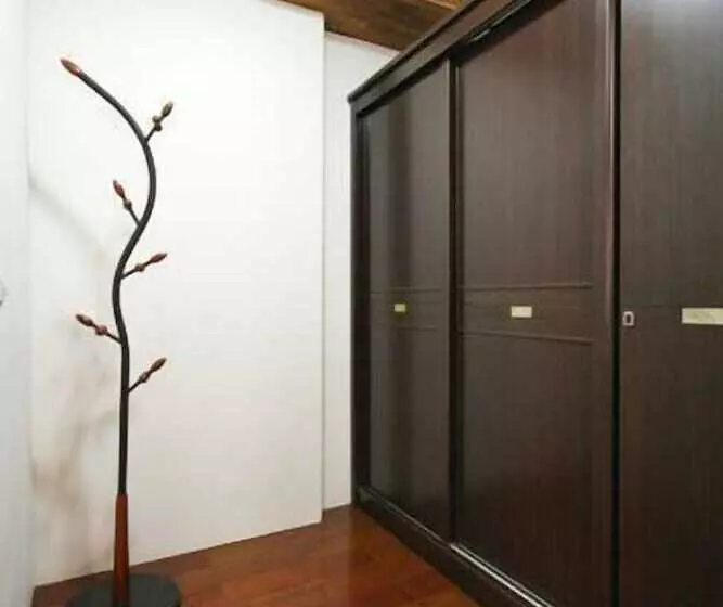 تختخواب و صبحانه Cao Ling Jiao Villa