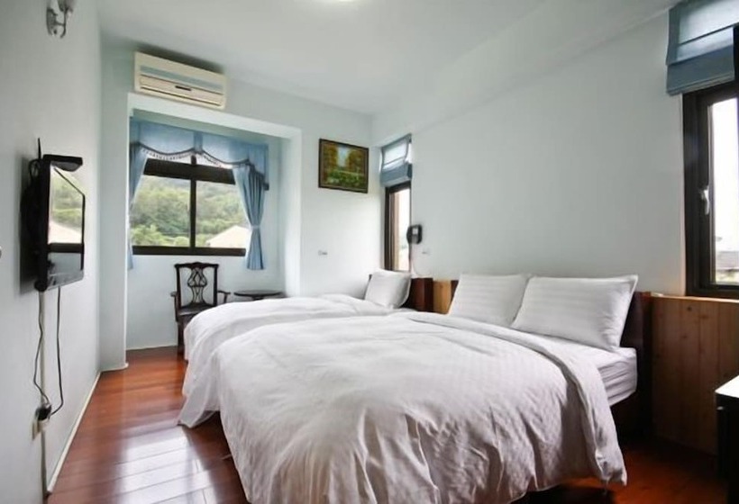 تختخواب و صبحانه Cao Ling Jiao Villa