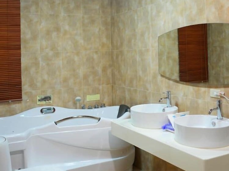 تختخواب و صبحانه Cao Ling Jiao Villa