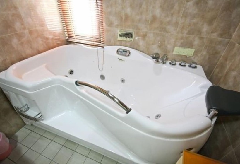 تختخواب و صبحانه Cao Ling Jiao Villa