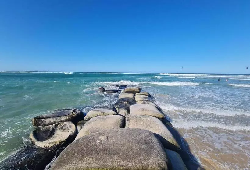 Surfcomber On The Beach