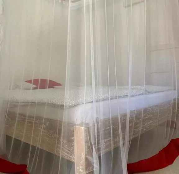 تختخواب و صبحانه Peekaboo Diani Beach