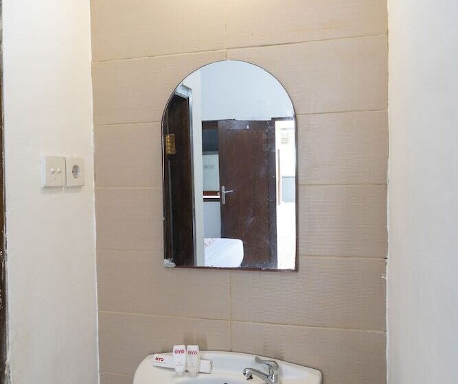 Отель Oyo 636 Apartmen Kak Okoh