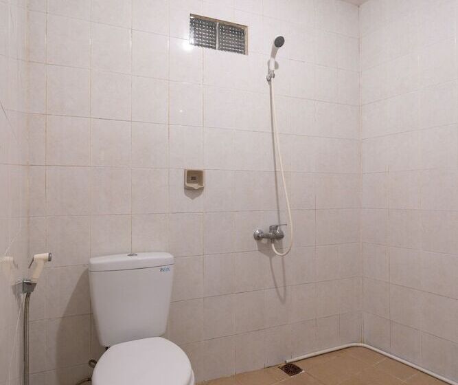 Отель Oyo 636 Apartmen Kak Okoh