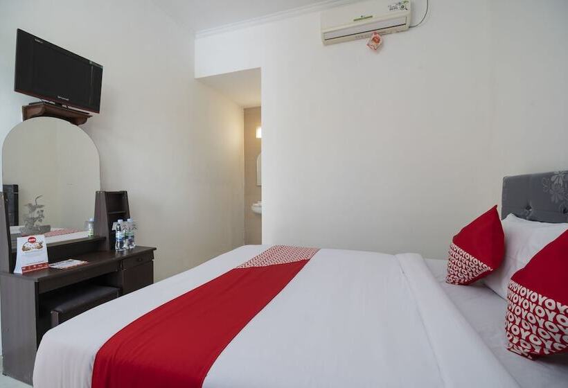 Отель Oyo 636 Apartmen Kak Okoh