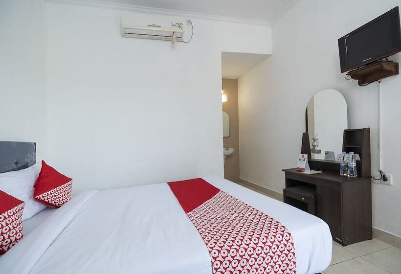 Отель Oyo 636 Apartmen Kak Okoh