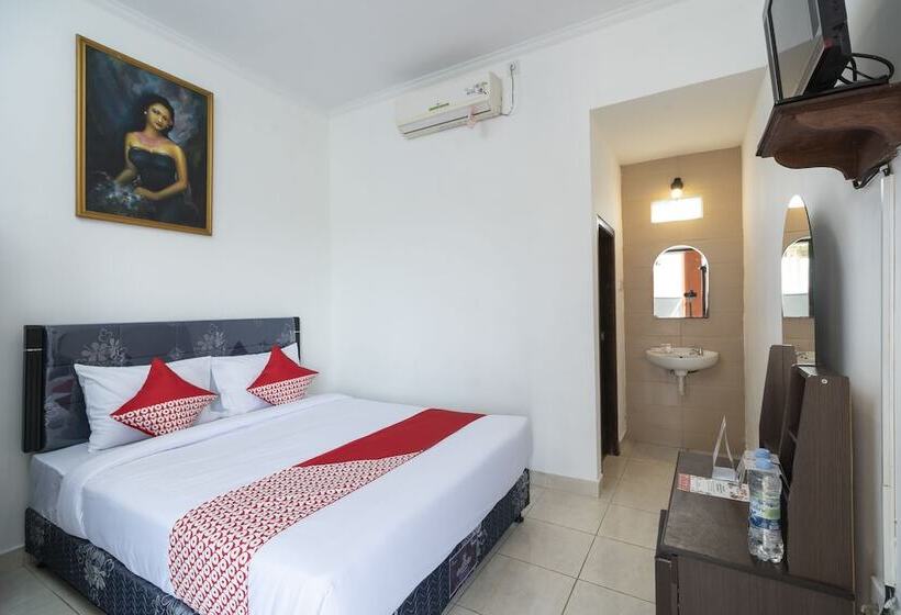 Отель Oyo 636 Apartmen Kak Okoh