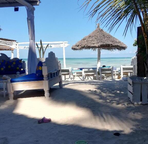 تختخواب و صبحانه Peter Pan Beach Lodge & Italian Restaurant