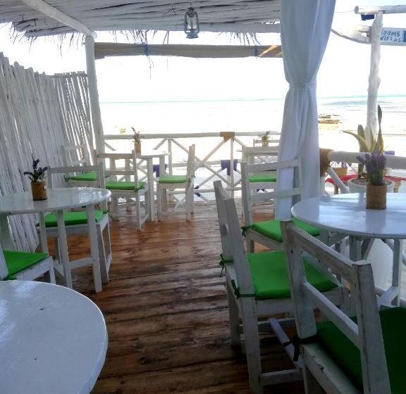 تختخواب و صبحانه Peter Pan Beach Lodge & Italian Restaurant