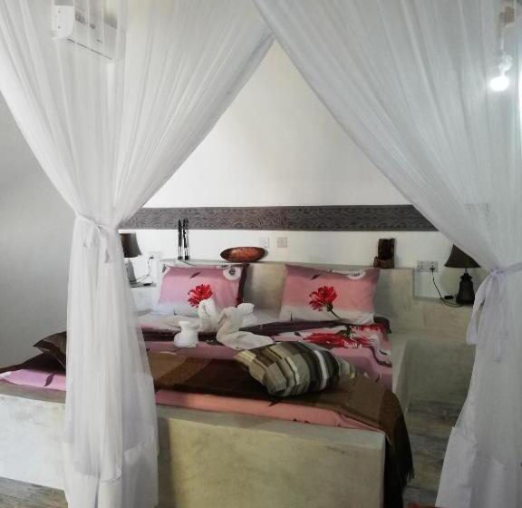 تختخواب و صبحانه Peter Pan Beach Lodge & Italian Restaurant