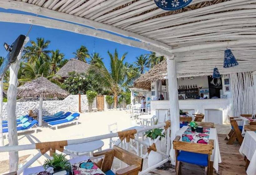 تختخواب و صبحانه Peter Pan Beach Lodge & Italian Restaurant