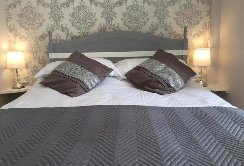 تختخواب و صبحانه Three Palms