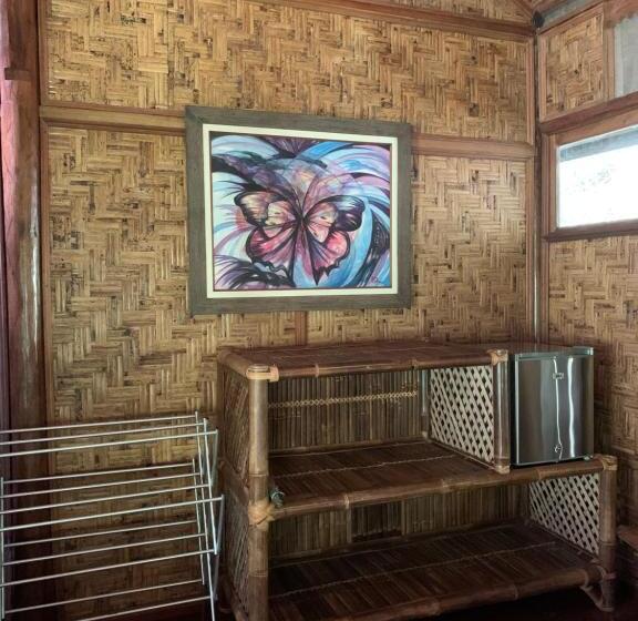 بنسيون Kupu Kupu Garden Guest House & Cafe