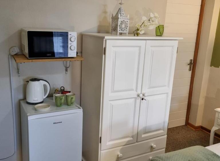 פנסיון Longtom Farm Guesthouse