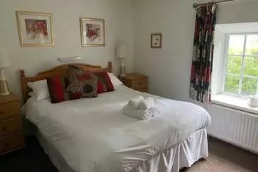 호텔 Thelbridge Cross Inn