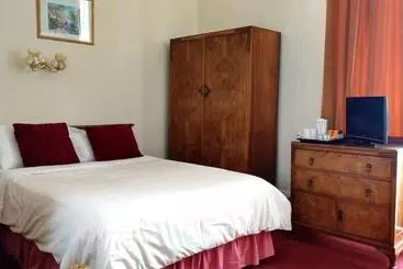 Pension (Hôtel basse catégorie) Milton Tower