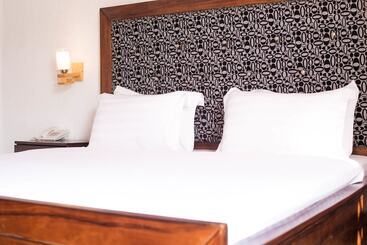 هتل Guesthouse Quatre Saisons