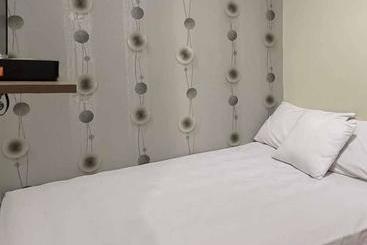 ホテル Aimer Guest House Syariah Mitra Reddoorz