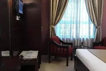 Hotel Golden Larch Residency