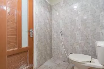 Hotell The Lima Guest House Syariah Mitra Reddoorz