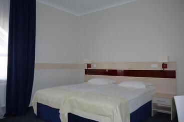 Отель Optima Pochayiv