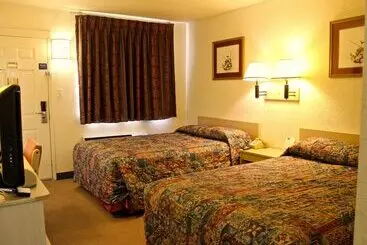 Отель Qc Stay Inn