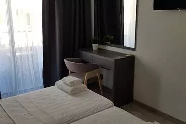 Pensionat Les Palmiers Petrou Apartments