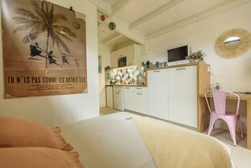 Appartements touristiques Les Cocottes Terre Sainte