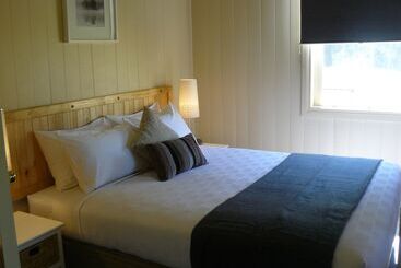 בית מלון כפרי Cypress Ridge Cottages