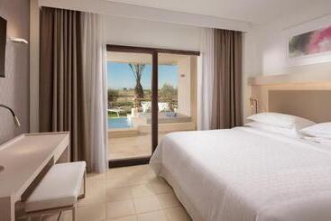 ホテル Ona Hacienda Del Alamo Golf Resort