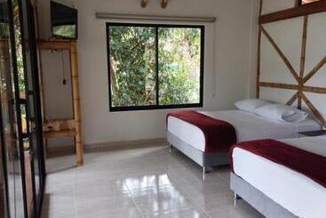 Bed & Breakfast Las Cabañas Del Escobo Cabaña Guacamayas