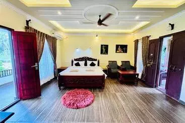 ホテル Maadathil Cottages & Beach Resort