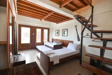 호텔 Agos Boracay Rooms + Beds