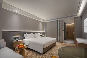 Отель Wanda Jin Jiamusi