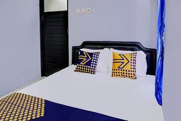 בית מלון כפרי Spot On 92353 Purnama Syariah Guest House