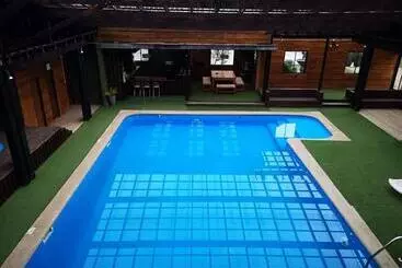 ペンション Hostal Y Cabañas Puerto Pucon