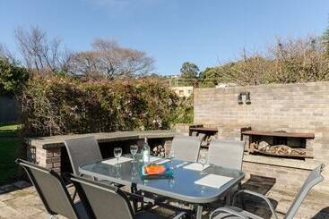 Жильё для туристов Sunrise At Penguin