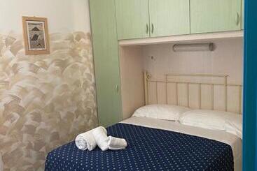 Отель Caravella