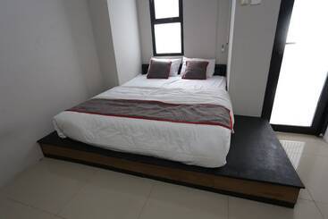 ホテル Collection O 93750 Luxury Rooms @ Urbantown Serpong