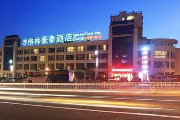 בית מלון כפרי Greentree Inn Shandong North Weihai Station North International Bathing Beach Business