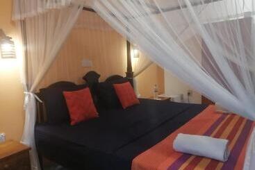 בית מלון כפרי Happy Beach Resort