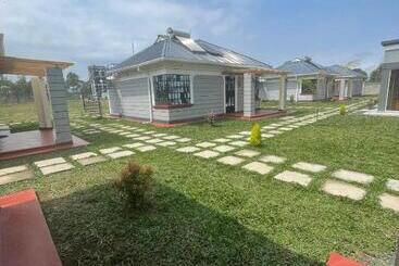 تختخواب و صبحانه Mavana Cottages