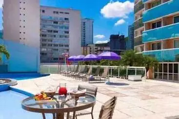 Flat Hotel Morador 1110 Suíte,sofá,varanda,cozinha